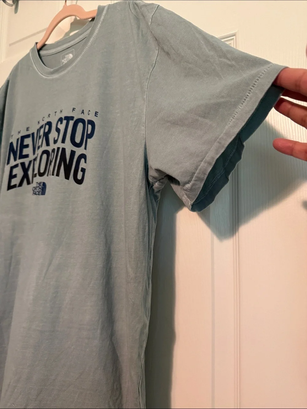 The North Face Sage Green Tee with Navy 'Never Stop Exploring' Print